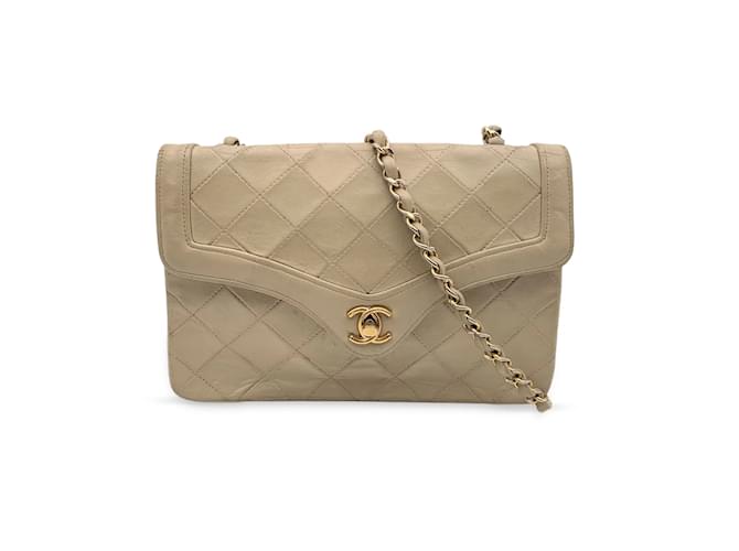 Quilted Chanel Bag W/ Embossed Cc Design & Chains/leather Straps