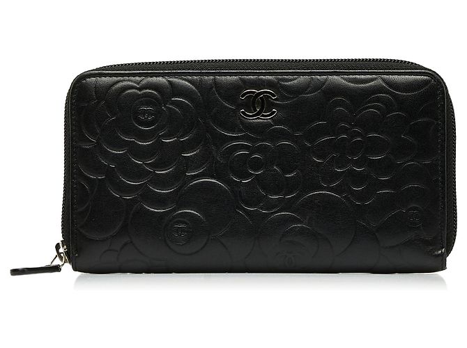 Cartera con cremallera alrededor de camelia negra de Chanel Negro