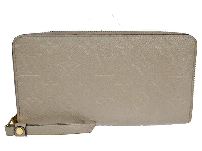 Louis Vuitton Portefeuille zippy Beige Leather  ref.1030225