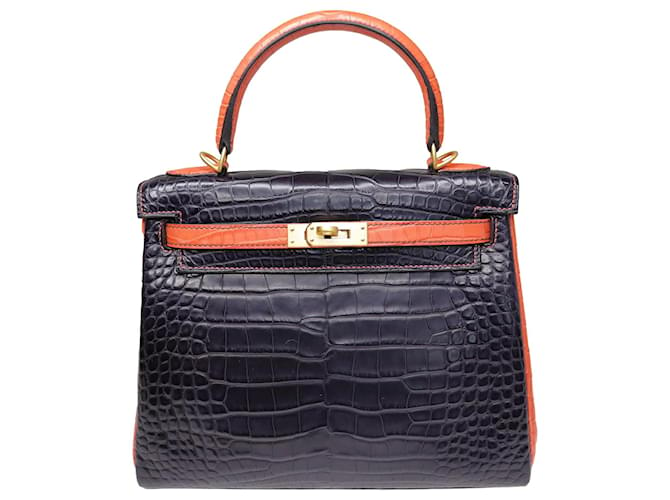 Hermès plum/Orange Kelly Retourne 25 with gold hardware Golden Exotic  leather ref.1035248 - Joli Closet