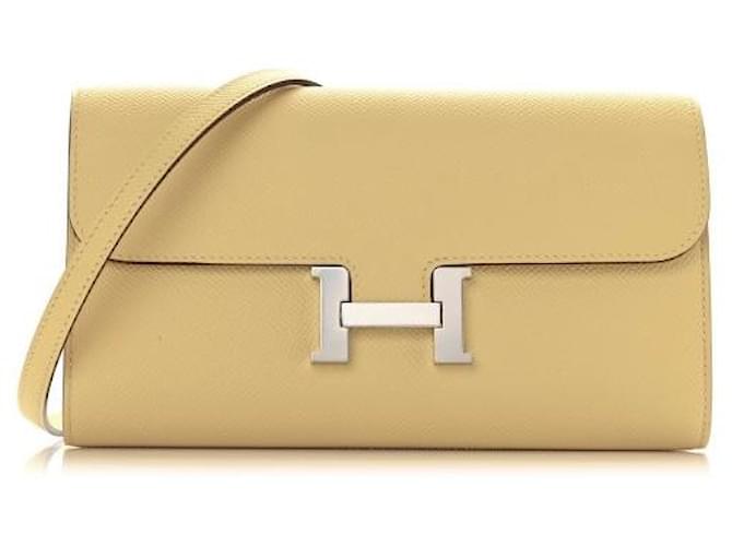 Constance Hermès carteras Amarillo Hardware de plata Cuero  ref.1041113