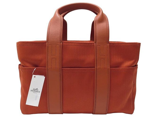 Hermès NOVA BOLSA HERMES ACAPULCO PM CABAS LONA E COURO LARANJA NOVA BOLSA DE MÃO