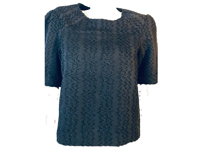 Top Maje con paillettes nero a maniche corte