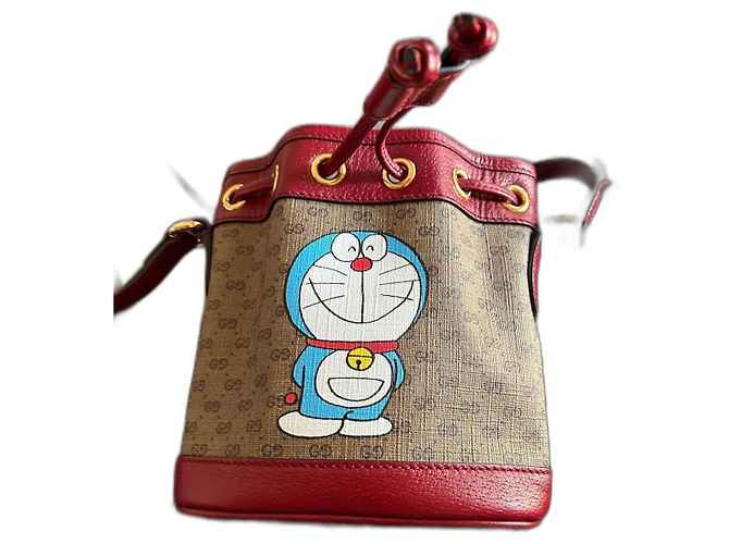 Gucci * Mini secchiello per caramelle Doraemon Caramello