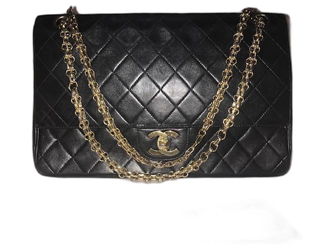 2.55 Chanel Black Leather vintage Medium lined Flap Bag  ref.1047196