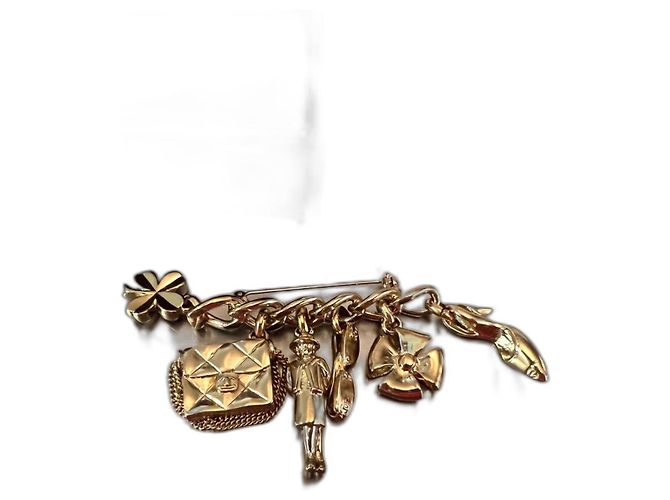 Chanel Brosche 6 Charms goldenes Metall