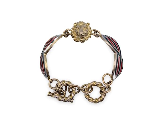 Gucci Bracelet chaîne à bascule tête de lion en métal doré émail rouge vert  ref.1048743
