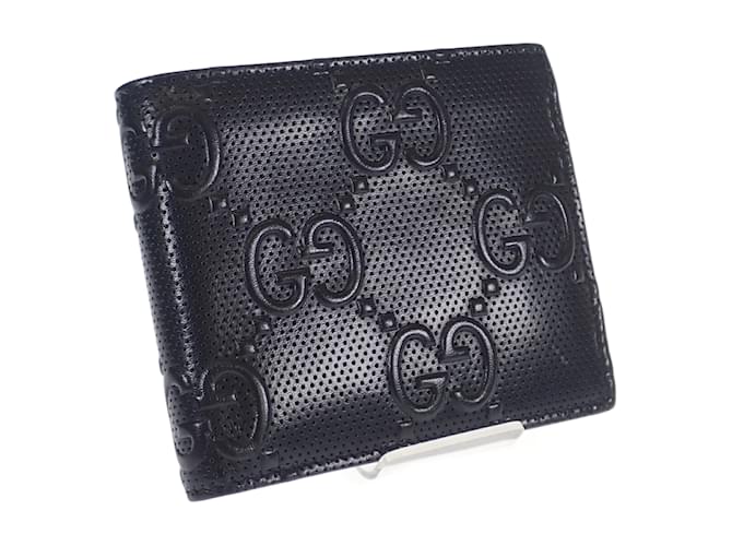Gucci Portafoglio bifold con scritta GG in rilievo Nero Pelle  ref.1048767
