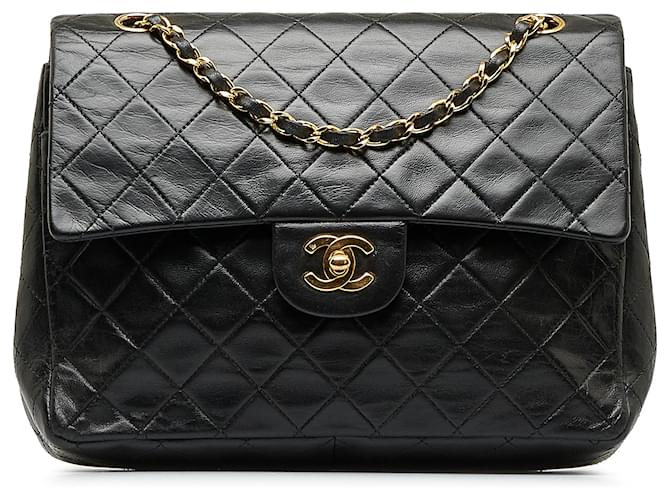 Chanel Black Medium Tall Classic Lambskin lined Flap Leather ref.1048893 -  Joli Closet