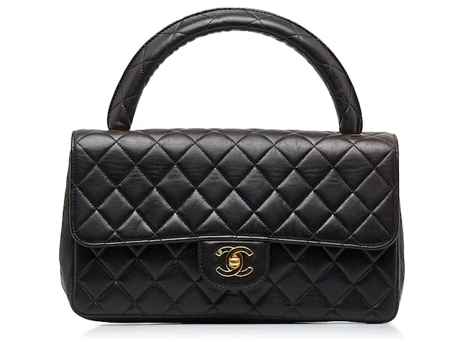 Chanel Schwarze mittelgroße Kelly Parent-Tasche mit Griff oben Leder  ref.1054579
