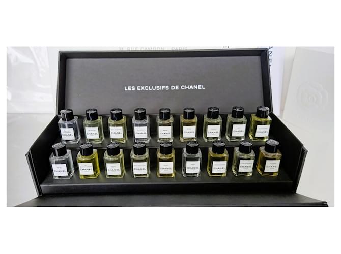 Chanel The Exclusives. Complete box of 18 miniatures. White Glass