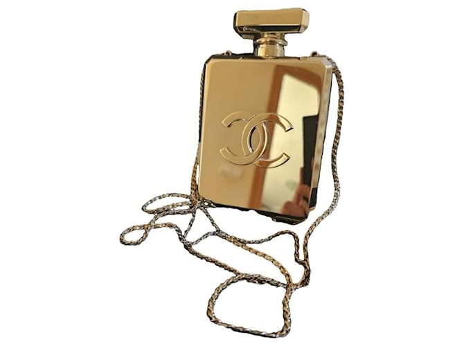 bolsa garrafa chanel Dourado Acrílico  ref.1055517