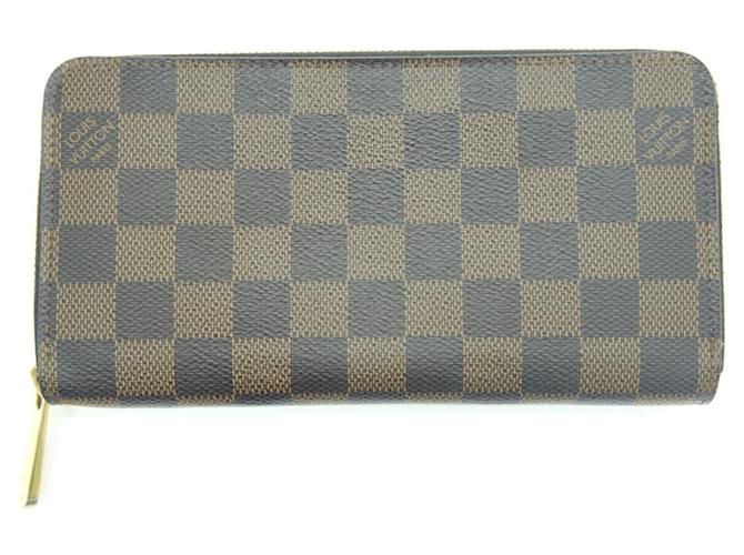 Louis Vuitton Portefeuille zippy Marrom Lona  ref.1055972