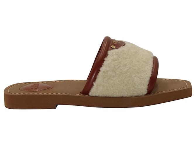 Chloé Mules planos Chloe Woody de piel marrón y borreguito color crema Castaño Cuero  ref.1056408