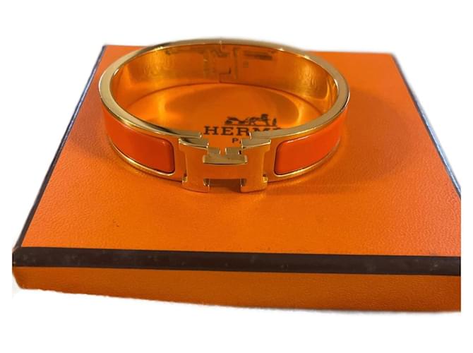 Hermès Armbänder Orange Vergoldet  ref.1058801
