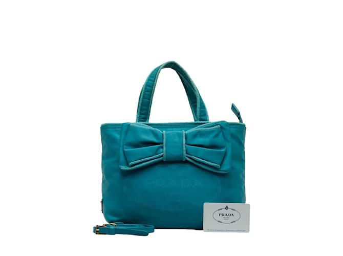 Bow Bolsa de mão Prada em nylon, couro, logotipo jacquard, fita 1BA084 em muito bom estado Azul Lona  ref.1063650