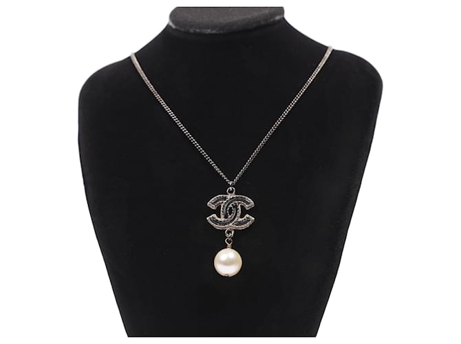 Chanel Pearl Logo Necklace Silver / Black Base Metal ref.1067638 - Joli  Closet