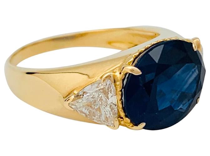 Autre Marque Un anillo.Reza en oro amarillo y zafiro 6,71 quilates y diamantes.  ref.1071402