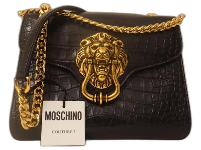 Bolsa tiracolo de couro com placa de leão Moschino Preto Cabra  ref.1073356