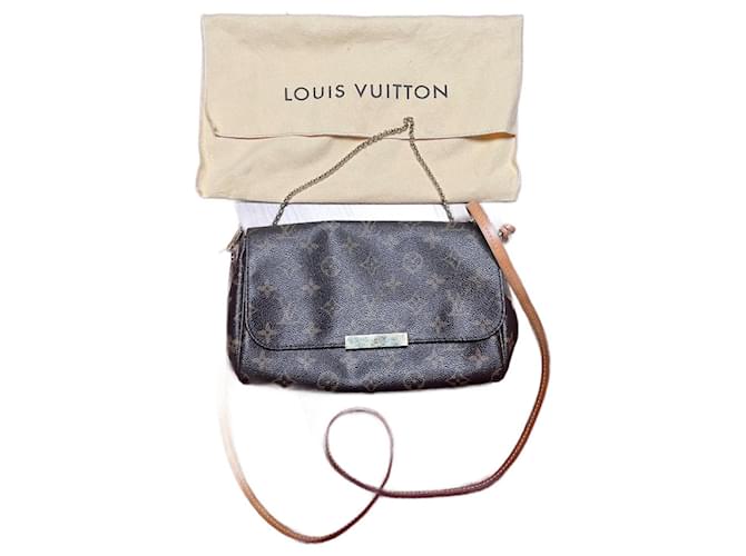 Louis Vuitton Clutch bags Brown Cloth  ref.1077068