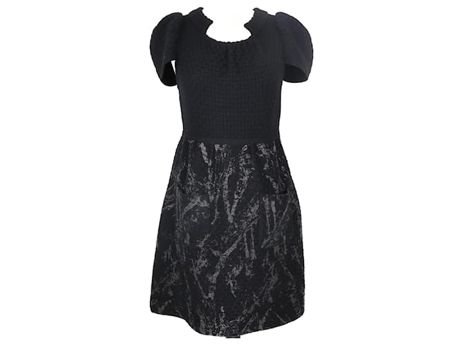 Chanel Vestido preto de malha com manga curta evasê Lã  ref.1077699