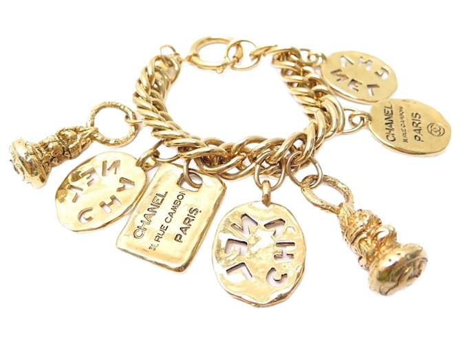 VINTAGE CHANEL BRACELET CHARMS CHARMS 1990'S GOLD METAL CUFF BANGLE Golden  ref.1079397