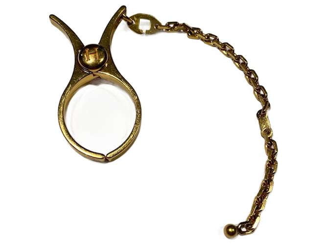 Pince à gants Hermès en métal doré Bijouterie dorée 