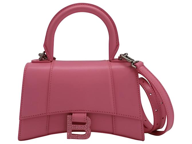 Bolso de mano Balenciaga Hourglass XS con logo de strass en piel de becerro rosa Plástico Poliuretano  ref.1082085