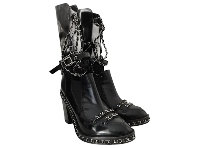 Pair of Chanel Obsession Boots from the Fall Fashion Show/Winter 2013-2014 Black Patent leather  ref.1083006