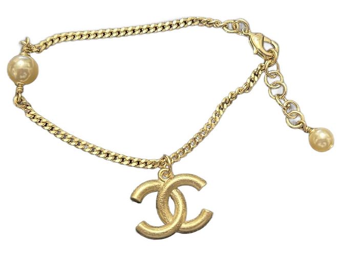 Pulseira de metal Chanel Dourado