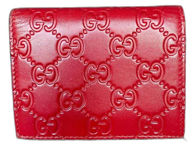 Cartera Gucci de piel roja con logo GG