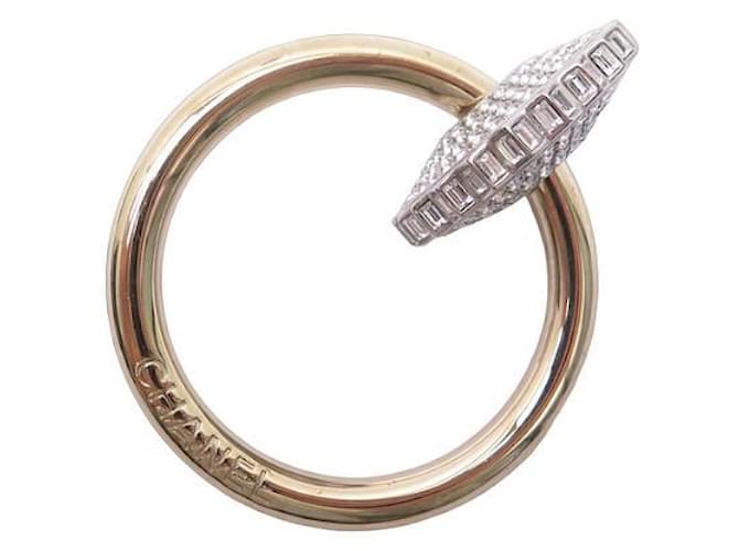 Autres bijoux BROCHE CHANEL ANNEAU ET STRASS EN METAL DORE STEEL GOLDEN RING BROOCH Métal Doré  ref.1087624