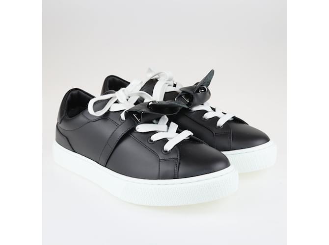 Hermès De color negro/Zapatillas blancas de día Cuero  ref.1091570