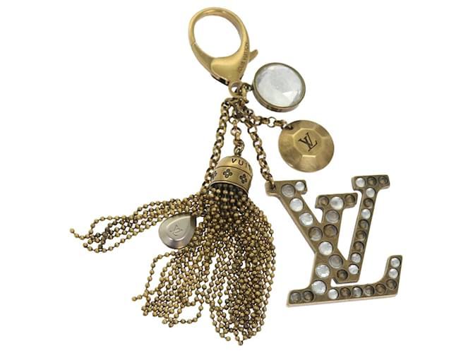 Porta-chaves LOUIS VUITTON Bijou Sack Caprice tom dourado M65724 Autenticação de LV 54608 Metal  ref.1094138