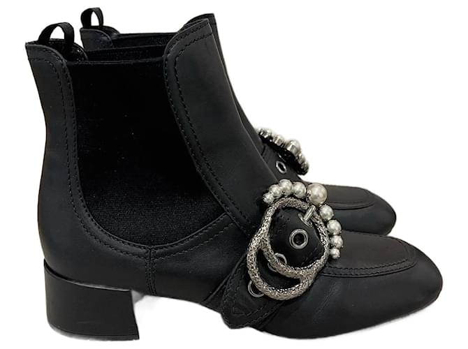 MIU MIU  Ankle boots T.eu 37 leather Black  ref.1096334