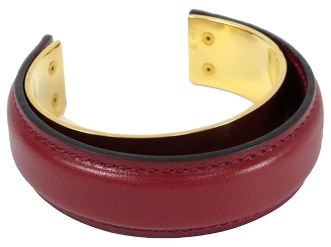 Hermès Bracelet manchette en cuir rouge Hermes Métal Veau façon poulain Plaqué or  ref.1106669