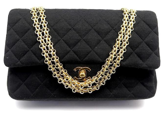 VINTAGE CHANEL TIMELESS HANDBAG IN BLACK QUILTED JERSEY CANVAS HAND BAG Cloth  ref.1106760