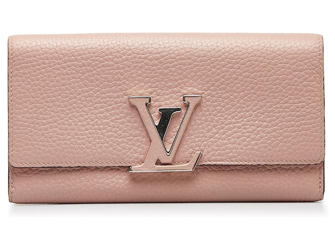 Portafoglio Louis Vuitton Capucines rosa Taurillon Pelle Vitello simile a un vitello  ref.1109439