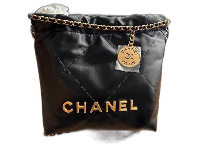 Borsa a mano Chanel 22 Mini in pelle di vitello nera Nero