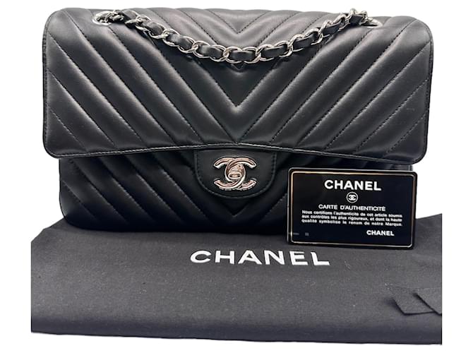 Chanel Bolsos de mano Negro Cuero  ref.1110036