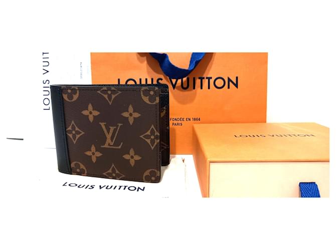 Louis Vuitton Multiple wallet in black leather and monogram canvas. Multiple colors  ref.1116901