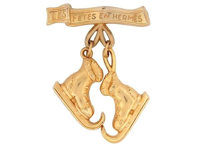 Other jewelry Hermès VINTAGE BROOCH LES FETES EN HERMES PLAQUE GOLD ICE SKATE GOLD PLATED BROOCH Golden Gold-plated  ref.1120285