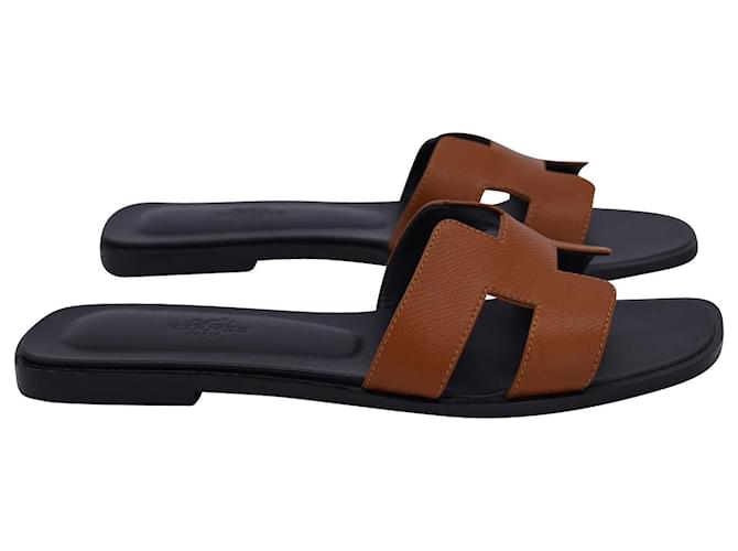 Hermès Hermes Oran Flat Sandals in Brown Calfskin Leather Pony-style calfskin  ref.1121263