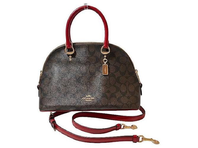 Coach Signature Katy Handbag  Canvas Handbag 2558 in Excellent condition Brown Cloth  ref.1131247