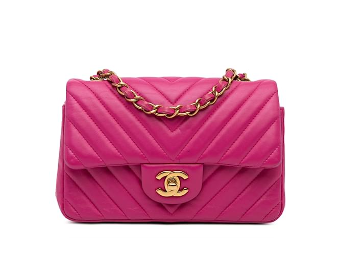 Bolso bandolera Chanel Mini Chevron clásico rosa con solapa y piel de cordero Cuero  ref.1134072