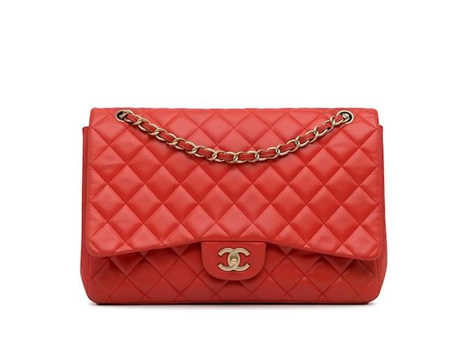 Bolsa Chanel Maxi Classic em pele de cordeiro laranja com aba única Couro  ref.1137210