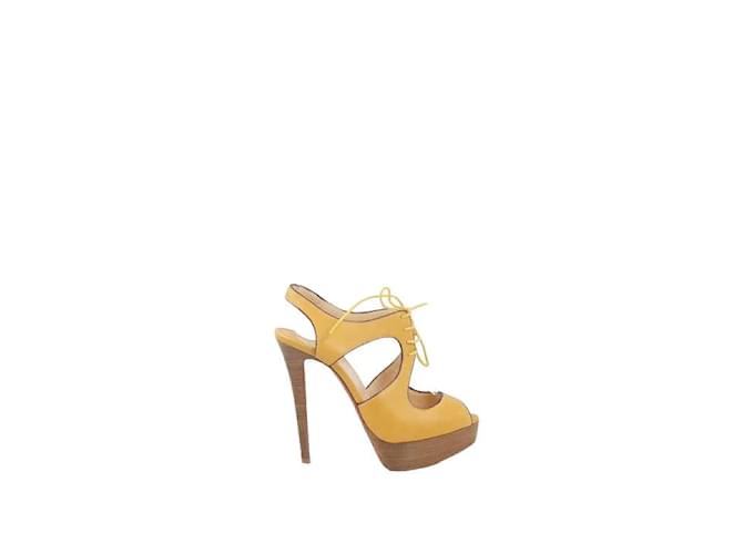 Christian Louboutin Talons en cuir Jaune  ref.1158202