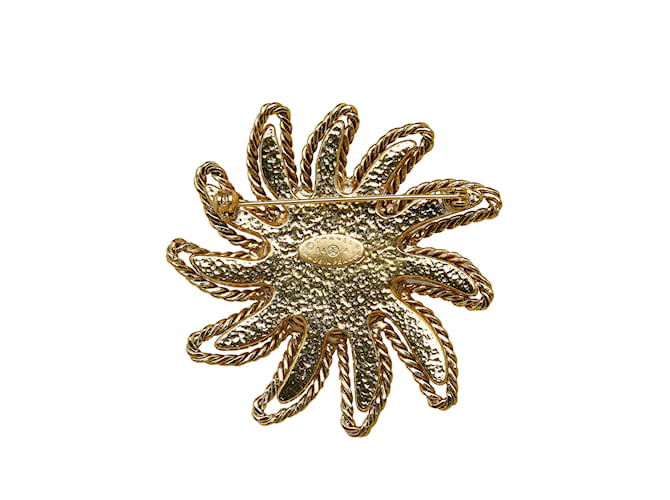 Spilla Chanel CC in oro con motivo sole D'oro Metallo  ref.1160724