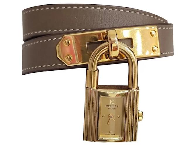 Kelly Hermès Feine Uhren Golden Leder Vergoldet  ref.1164602