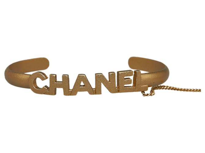 Chanel Gold Logo Bangle with Chain Attached CC Crystal Ring Golden Metal Gold-plated  ref.1165787